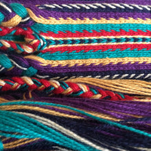 Load image into Gallery viewer, Colorful, tablet woven strap - southwest motif in turquioise,purple, gold and flame red. with colorful, braided, tassel ends.
