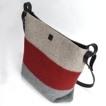 Load image into Gallery viewer, Knit-felted, ultra-fine merino wool handbag in Smoke, Flame and Cloud. Vegetable tanned English bridle leather strap and trim with lacquer-finished, brushed nickel hardware. 
